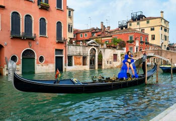 Gondola with a new Sophia Loren on the Mendicanti Canal, in front of the Cavallo Bridge, along San Giovanni e Paolo's Square in the Castello District in Venice
