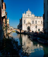 The Scuola Grande San Marco, the Cavallo Bridge and the Mendicanti Canal along the San Giovanni e Paolo's Square in the Castello District in Venice
