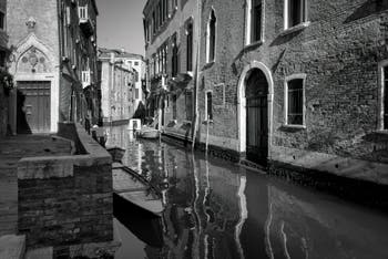 The entrance of the Van Axel Palace and the Panada Canal reflections in the Cannaregio District in Venice.
