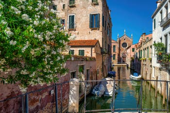 The Brazzo Canal and the Madona de l'Orto Church in the Cannaregio District in Venice.