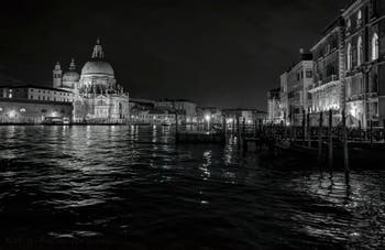 The Madonna de la Salute Church and Venice Grand Canal by night.