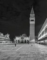 The Saint-Mark Square in Venice with the Bell Tower and the Basilica.
