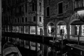 The Santi Apostoli Canal reflections and the del Magazen and Fallier Sotoporteghi in the Cannaregio District in Venice.