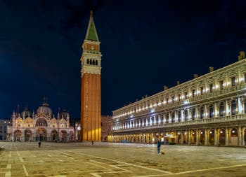 Venice by Night: The Saint-Mark Square, Bell Tower and Basilica.