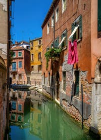 The San Zaninovo Canal and the drio Ruga Giuffa Bank, in the Castello District in Venice.