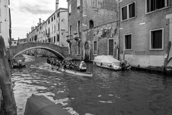 Dragon Boat on Santa Caterina Canal in front of the Gesuiti Bridge in the Cannaregio District in Venice