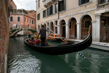 Gondola on the Santi Apostoli Canal in front of the Sotoportegho del Traghetto in the Cannaregio District in Venice