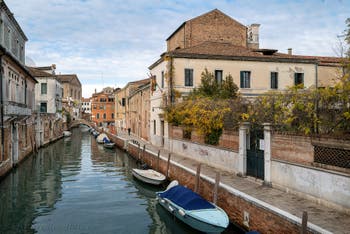 The Santa Caterina Canal and Bank, the Molin o de la Racheta Bridge in the Cannaregio District in Venice