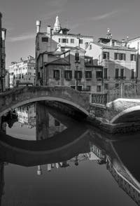 The Mirrors of Venice: The Mondo Novo Canal and the Querini Stampalia Square in the Castello in Venice.