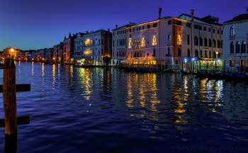 Venice Grand Canal by night with the Ca' d'Oro and Ca' Sagredo Palaces.