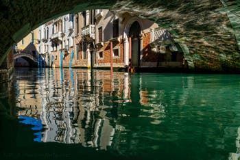 The Palazzo Canonica Canal's reflections in the San Marco District in Venice.