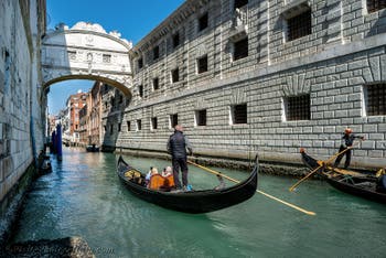 Gondolas in front of the Bridge of Sighs on Palazzo o Canonica Canal in Venice
