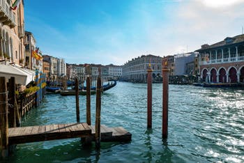 Santa Sofia's Gondolas on Venice Grand Canal in front of the Rialto fish market.