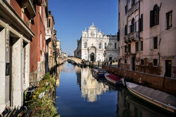 The Mendicanti Canal and the Scuola Grande San Marco in the Castello district in Venice.