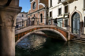The Ubaldo Belli Bridge, San Felice Canal and Church in Cannaregio district in Venice.