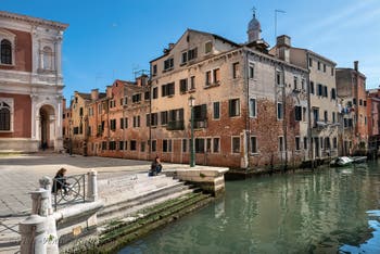 San Pantalon Canal and Castelforte Square behind the Scuola San Rocco, in San Polo district in Venice.