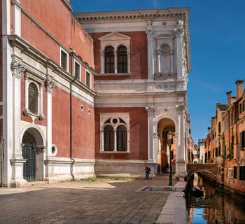 The de la Frescada San Rocco Canal and the Scuola San Rocco in the San Polo district in Venice.