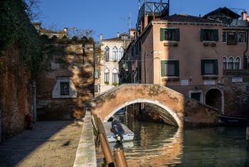 The Grimani Bank and Canal and the Moro Bridge in the Cannaregio district in Venice.