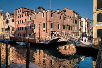 The Ognissanti Canal and bank with the Borgo Bridge and the Eremite bank in the Dorsoduro district in Venice.