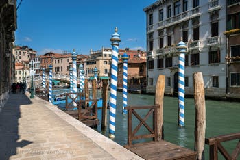 The mooring stakes of the Cannaregio Canal before the Guglie Bridge in Venice.