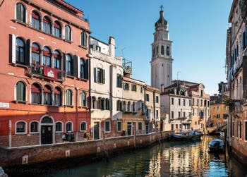 The Pieta Sant Antonin Canal along the dei Furlani Fondamenta Bank and the Sant Antonin Bell Tower in the Castello district in Venice.