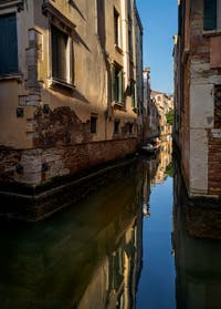 San Stae Canal reflections in Santa Croce district in Venice.