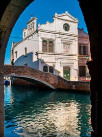 The Scuola di San Giorgio degli Schiavoni Dalmati and the Comenda Bridge in the Castello district in Venice.