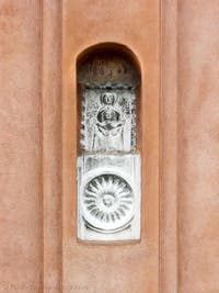 Madonna with Child of the Kyriotessa type and a radiant circle sculpture, on San Felice Bell Tower in Venice