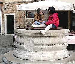 campo san stefano venice italy well children play