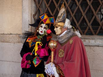 Venice Carnival 2022 Masks and Costumes in front of the Doge's Palace and St. Mark' Basin