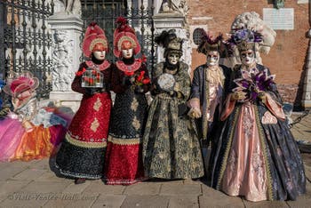 Venetian Carnival masks and costumes, birdcatchers in red and black at the Arsenal.
