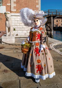 Masks and Costumes at the Venice Carnival, The Princess of the Lions with her orange at the Arsenal.