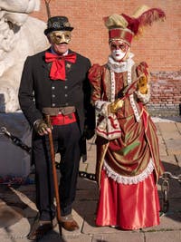 Costumes and Masks at the Venice Carnival, The Young Princess in the Mirror in Red and Gold at the Arsenal.