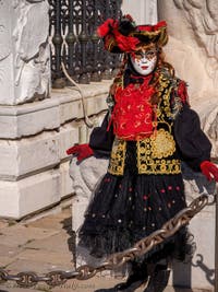 Venetian Carnival Masks and Costumes, Florine in Red and Black at the Arsenal.