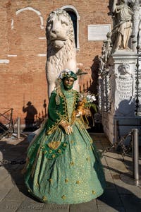 Graceful green lady blooming at the Arsenal, Venetian Carnival Masks and Costumes.