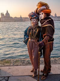 Venetian Carnival masks and costumes, silk and pearls in San Giorgio Maggiore 