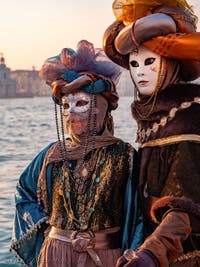 Venetian Carnival masks and costumes, silk and pearls in San Giorgio Maggiore 
