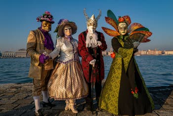 Venetian Carnival masks and costumes, rural Corollas in San Giorgio Maggiore