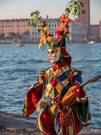 Venetian Carnival masks and costumes, minstrel at San Giorgio Maggiore