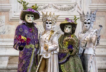 Venetian Carnival Masks and Flower Costumes among Snow Princesses on San Zaccaria Square in the Castello district