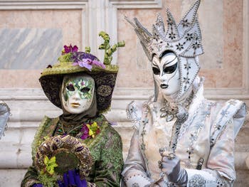 Venetian Carnival Masks and Flower Costumes Among Snow Princesses on San Zaccaria Square in the Castello district