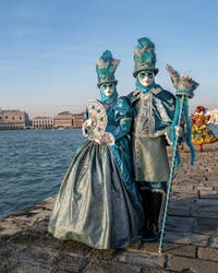 Superb Venetian Carnival Costume and Mask: In the blue sky of Venice, feathers, silk and embroidery on the island of San Giorgio Maggiore