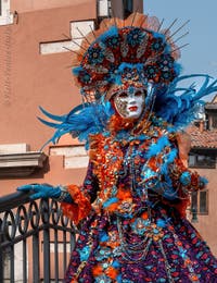 People in costume at the Venice carnival on Campo San Martin.