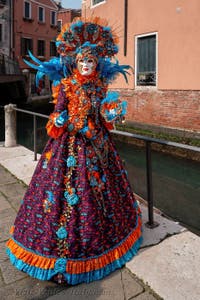 People in costume at the Venice carnival on Campo San Martin.