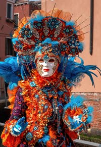 People in costume at the Venice carnival on Campo San Martin.