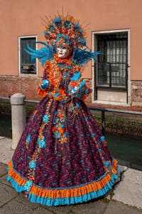 People in costume at the Venice carnival on Campo San Martin.