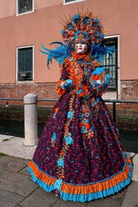 People in costume at the Venice carnival on Campo San Martin.