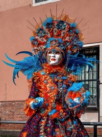 People in costume at the Venice carnival on Campo San Martin.