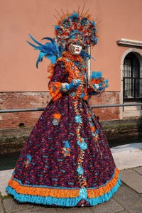 People in costume at the Venice carnival on Campo San Martin.