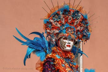 People in costume at the Venice carnival on Campo San Martin.